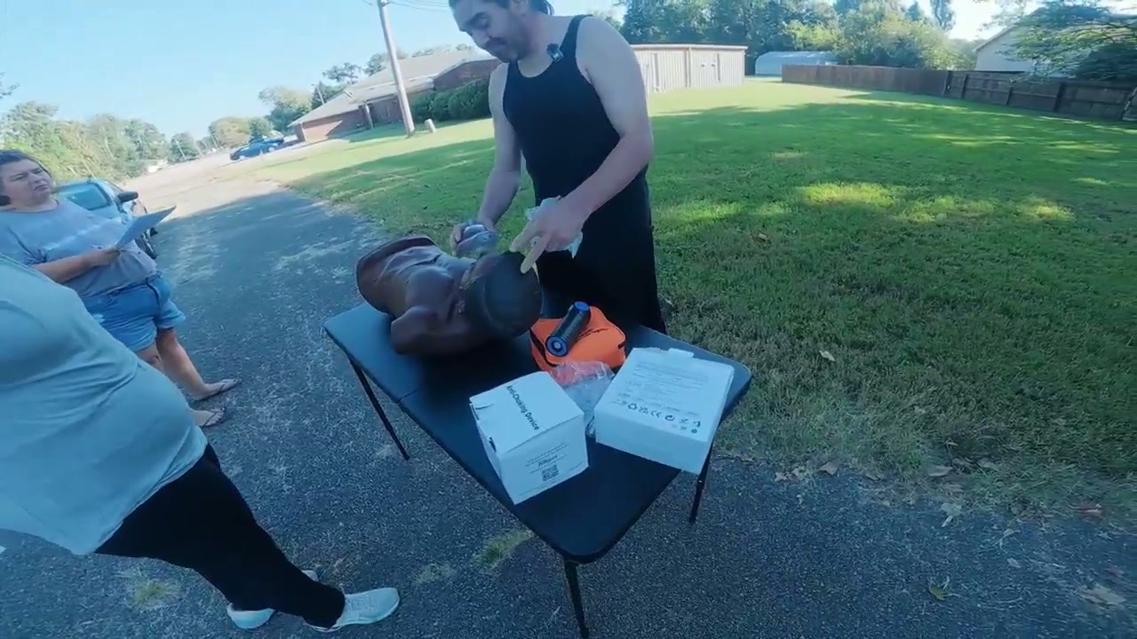 Real frame around twelve seconds into observation three with a separate mask near the manikin and device on an orange pouch